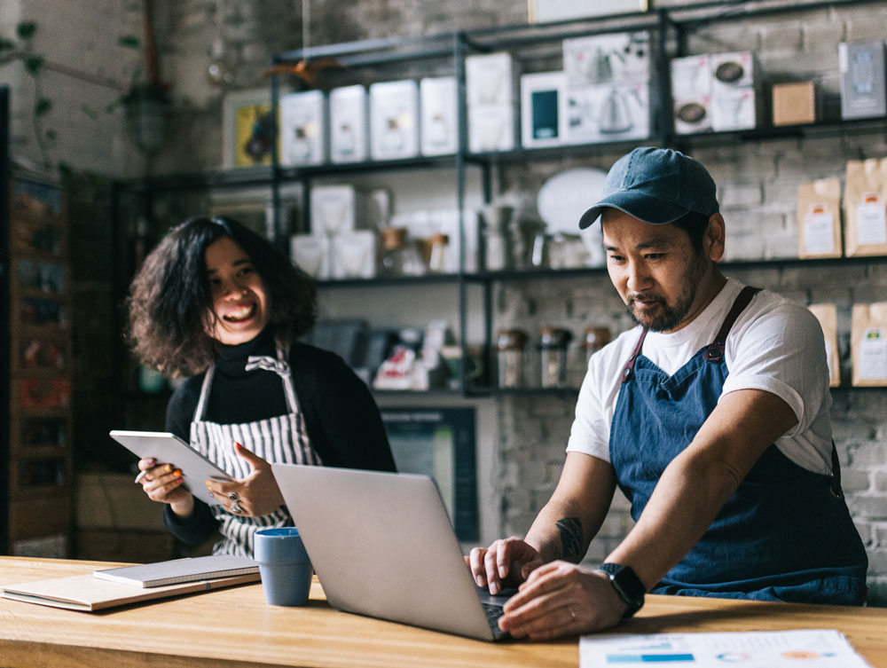 Two business owners go over their financials.